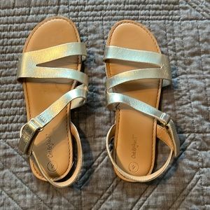 Gently used Cat & Jack gold sandals, size 4.